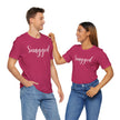 Snagged, Rez Humor, Black or Pink Unisex Jersey Short Sleeve Tee